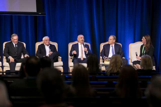 Founders of the California Institute for Immunology and Immunotherapy are interviewed during a panel discussion.